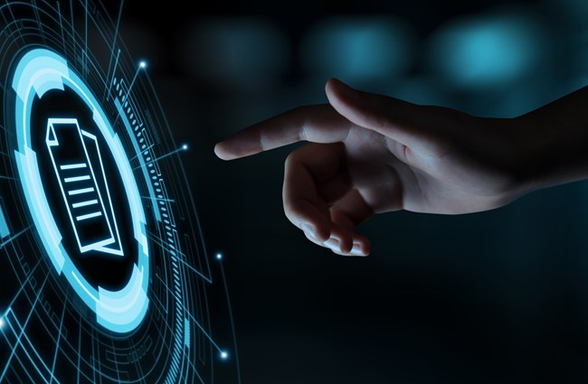 A man's hand pointing at a futuristic screen with a graphic