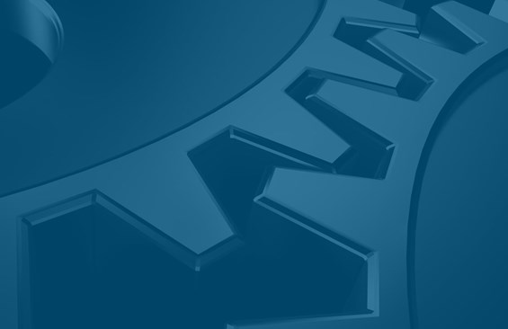 A close up of two cogs intermeshed 