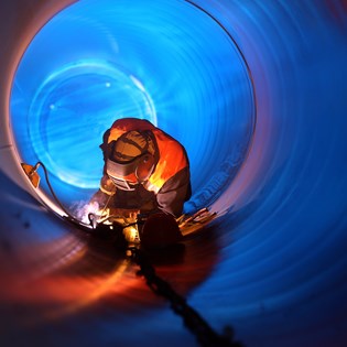 worker inside pipe